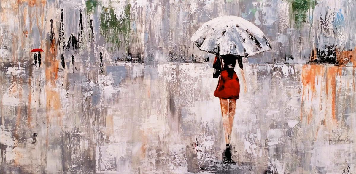 Mujer paseando bajo la lluvia en Barcelona 1