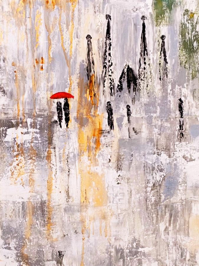 Mujer paseando bajo la lluvia en Barcelona 3